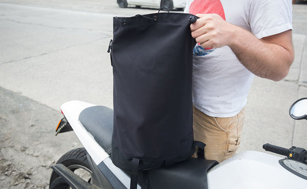 Shadow Guide with the top pocket folded back and the main compartment fully opened/tall.